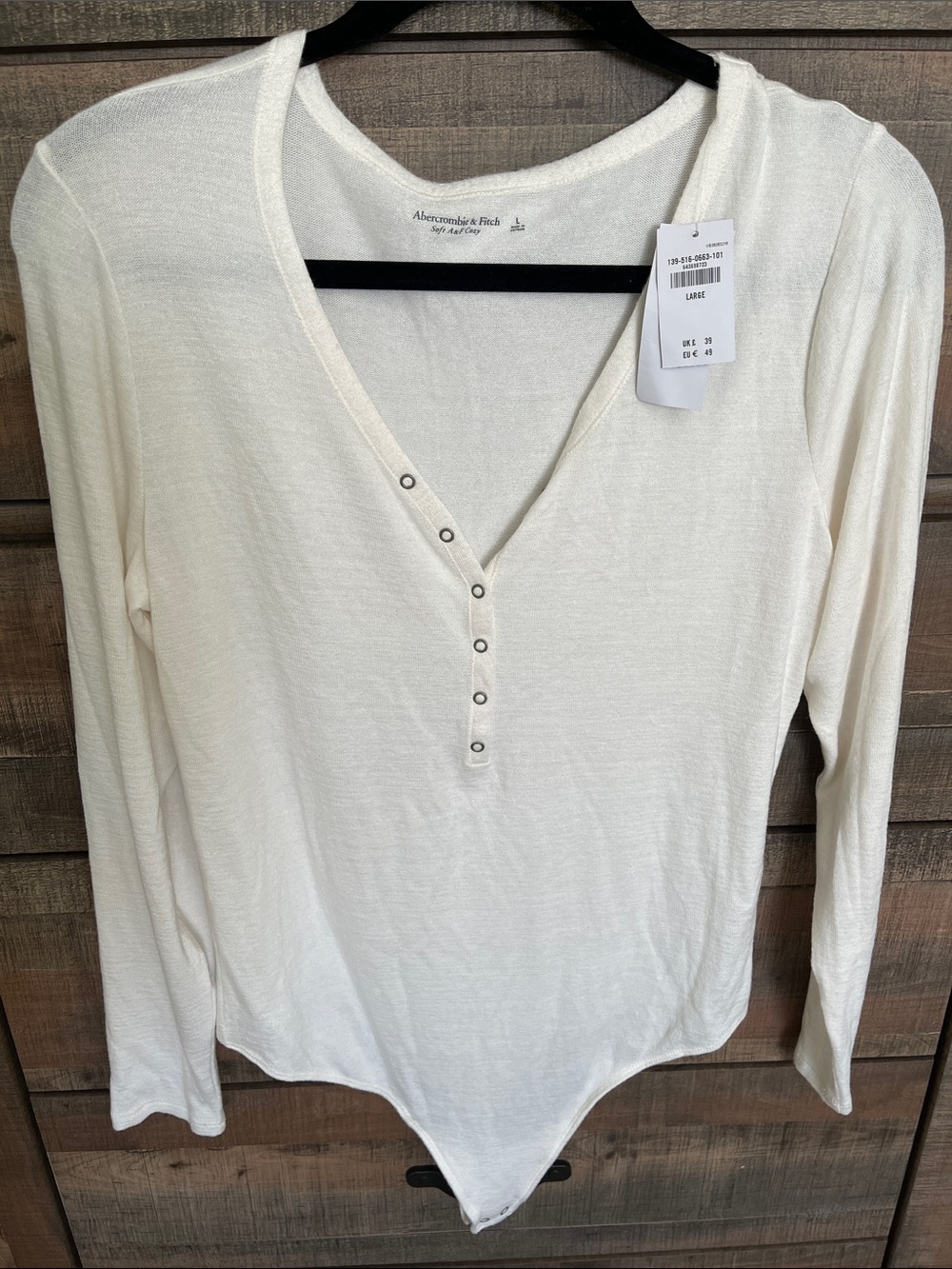 | Abercrombie & Fitch | Cream Long-Sleeve Snap Henley Bodysuit